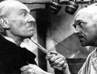 William Hartnell in a staring competition with The Smugglers.