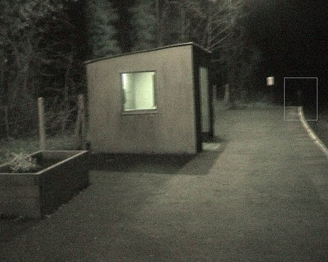 A white figure shaped mass is visible at the end of the platform.